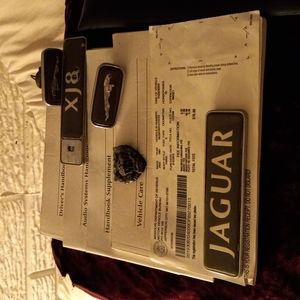 Jaguar 2001 xj8 decals and owners manual.